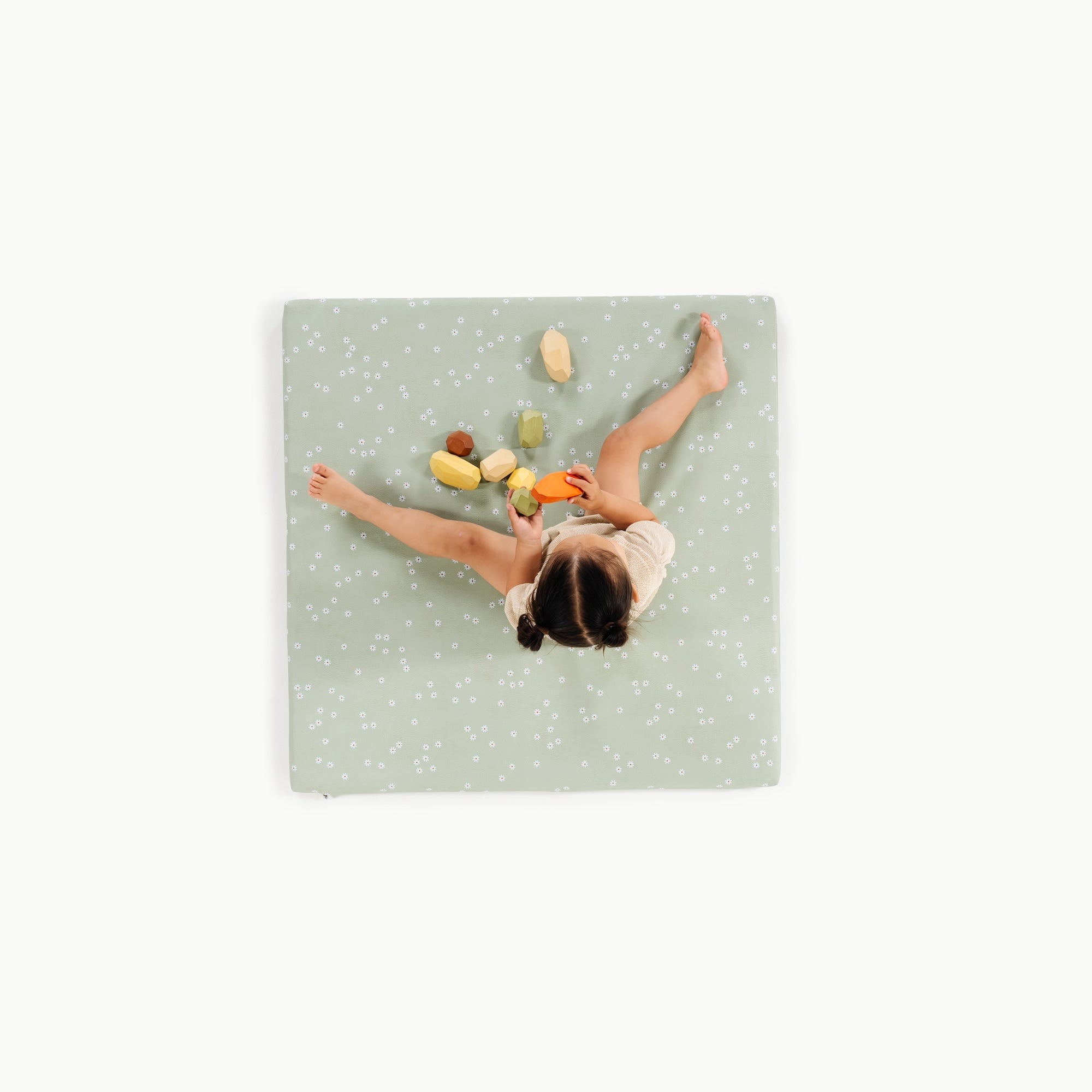 Flora (on sale)/ Square@overhead of little girl playing on padded mat