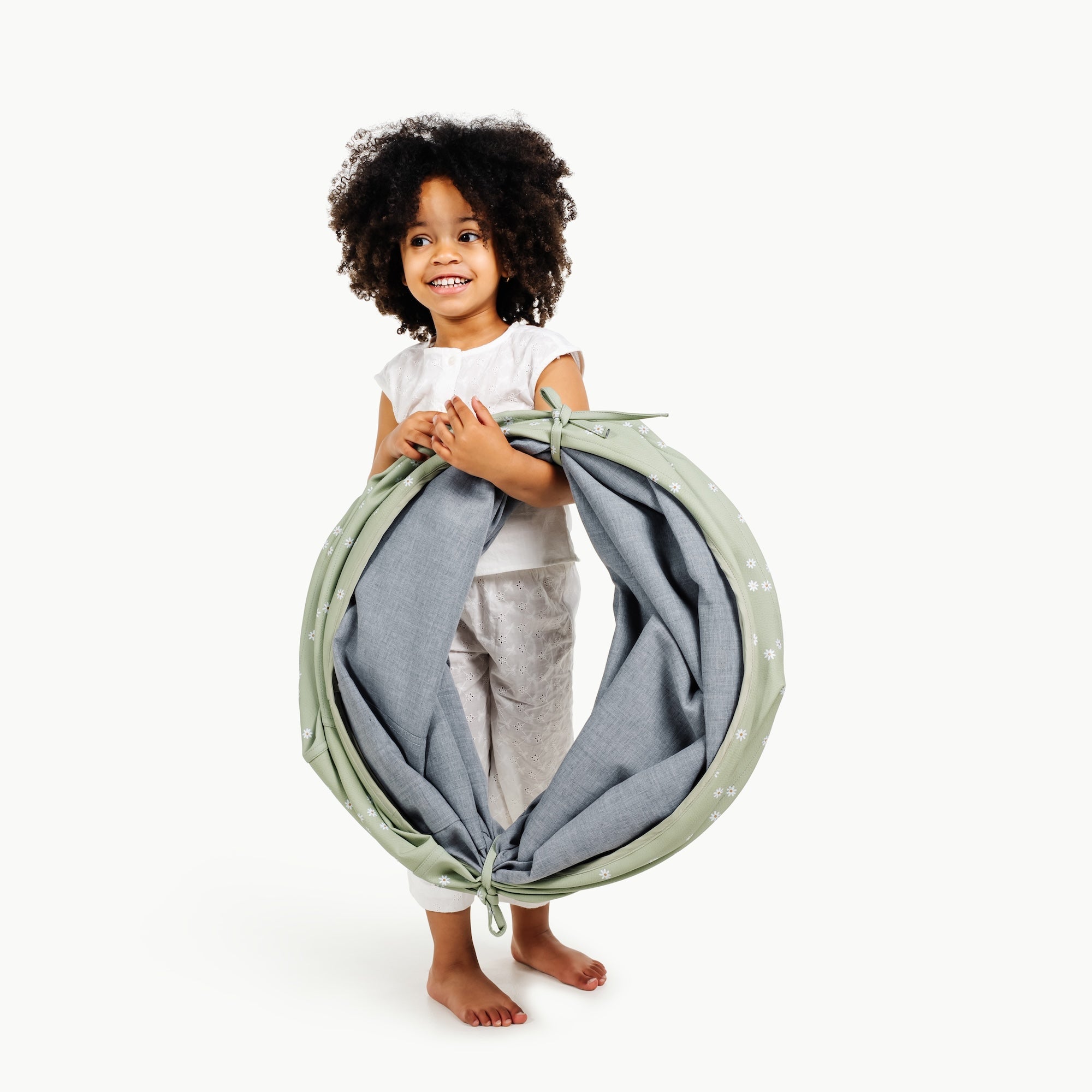 Flora (on sale)@toddler holding folded tunnel