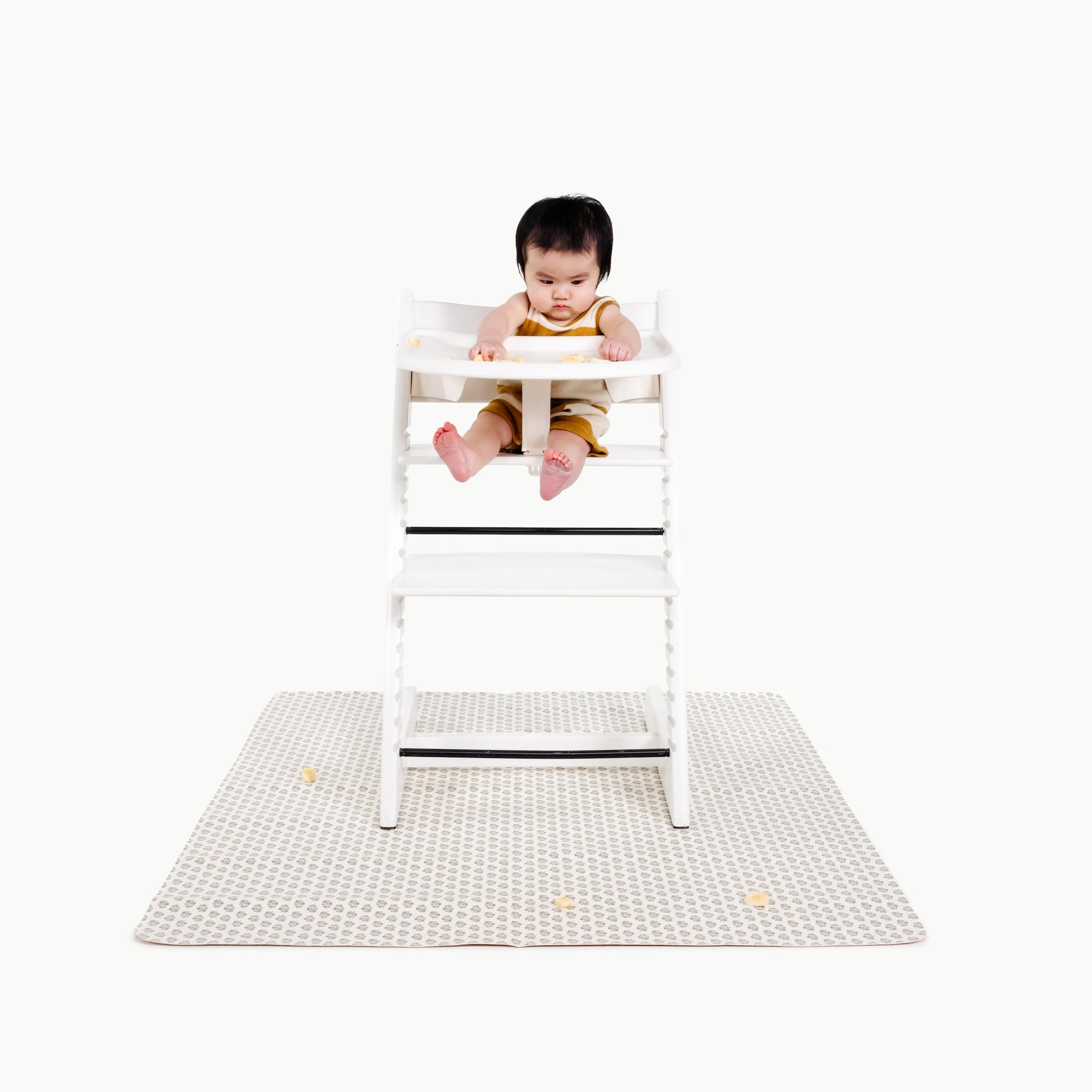 Meadow@baby in a highchair on the meadow mini