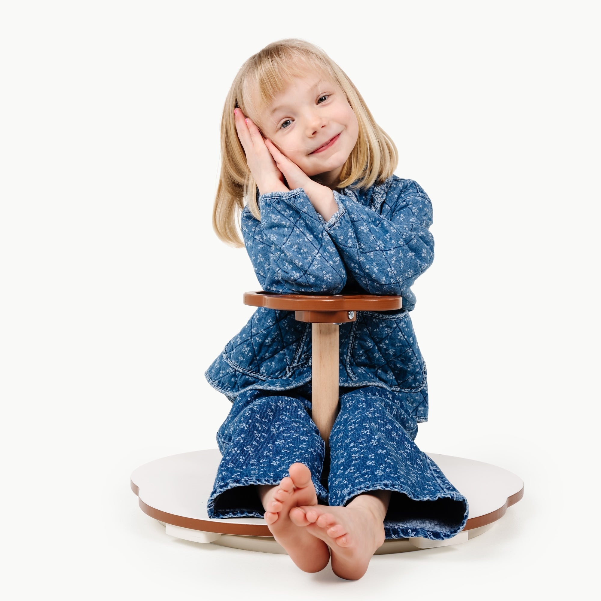 Teak@Modern sit and spin toy for toddlers designed for indoor movement