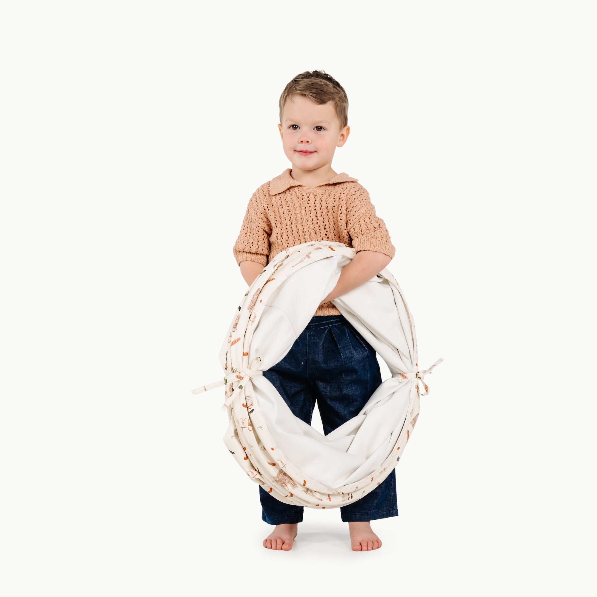 Paris (on sale)@kid holding the paris tunnel tied together