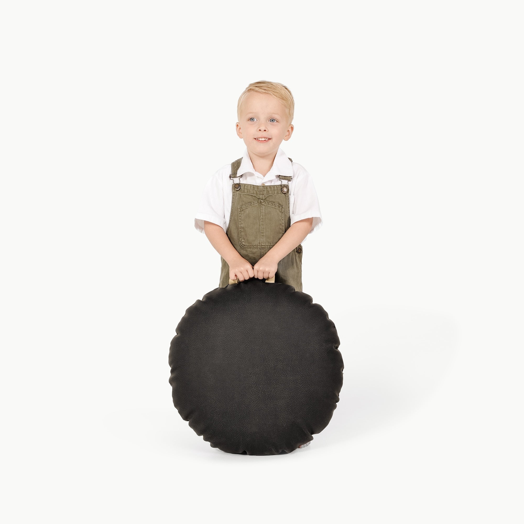Raven (on sale)/ Circle@Little Boy holding the Raven Mini Circle Floor Cushion