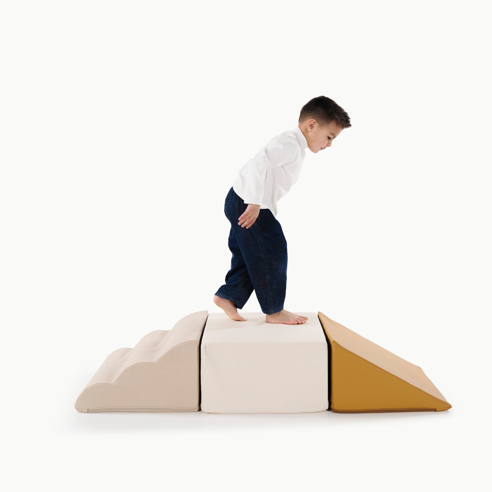 Ivory • Millet • Saffron (on sale)@little boy playing on the mini climber