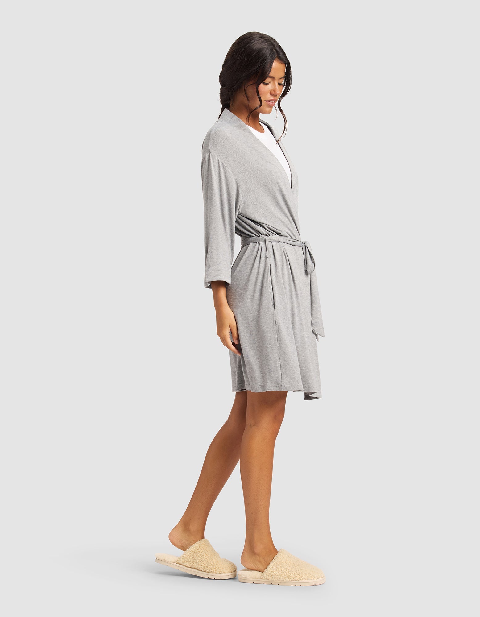 Grey@woman wearing a grey cozy earth robe