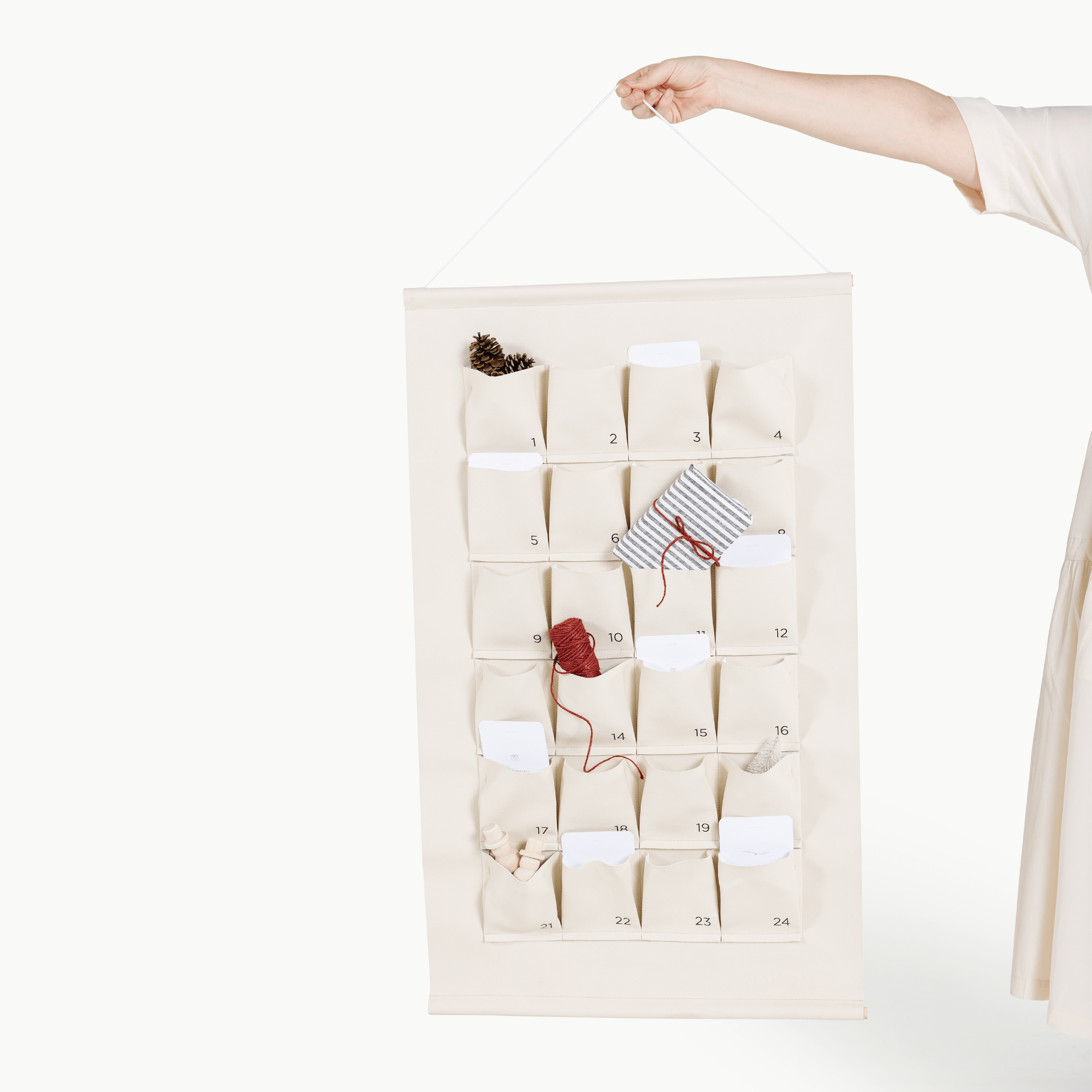 Ivory (on sale)@Woman holding the Small Ivory Advent Calendar