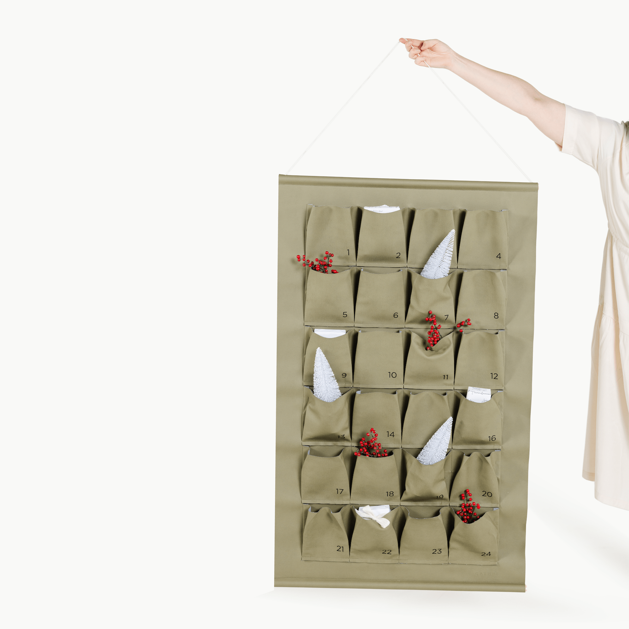 Fern (on sale)@Woman holding the Large Fern Advent Calendar