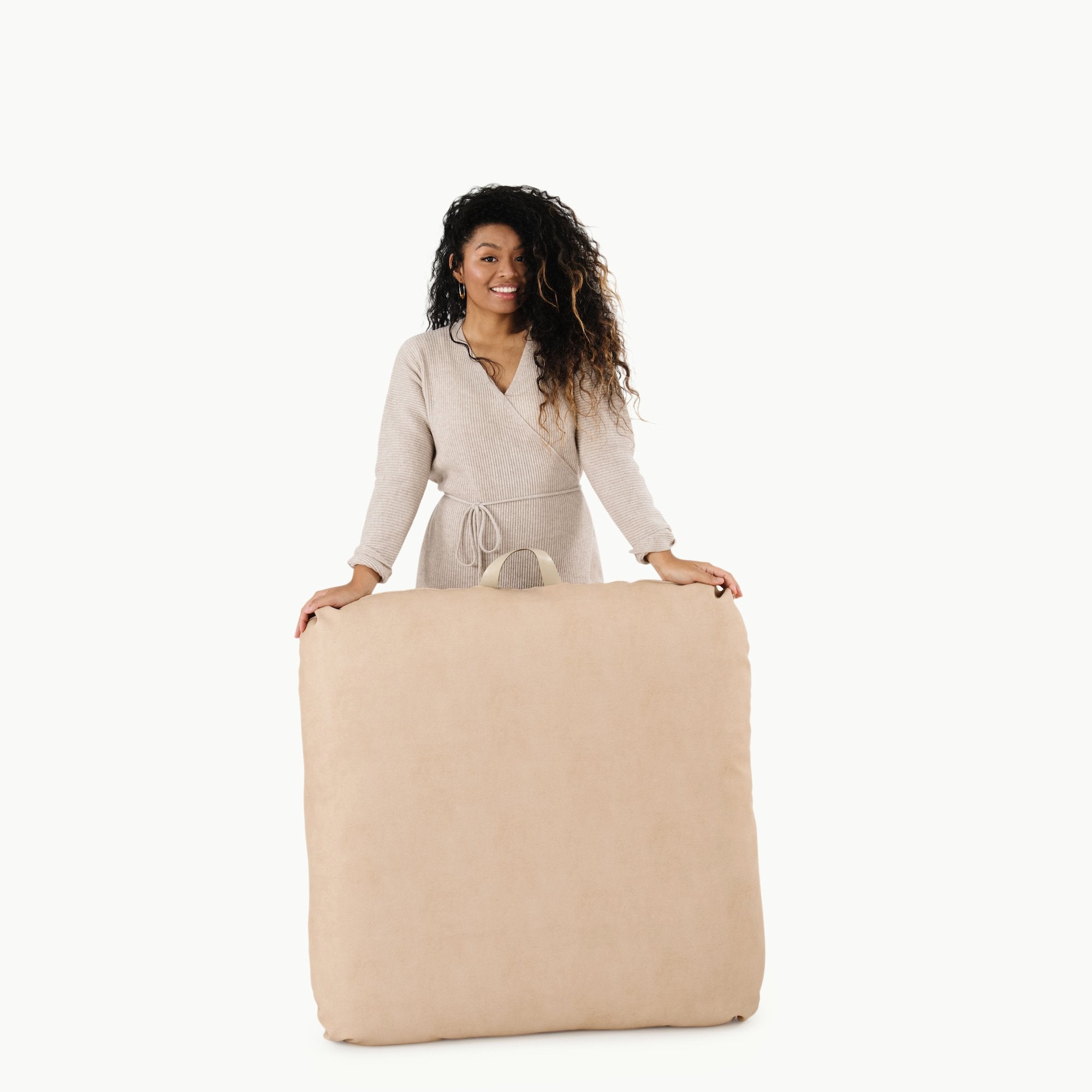 Untanned (on sale) / Square@Woman holding the Untanned Square Floor Cushion