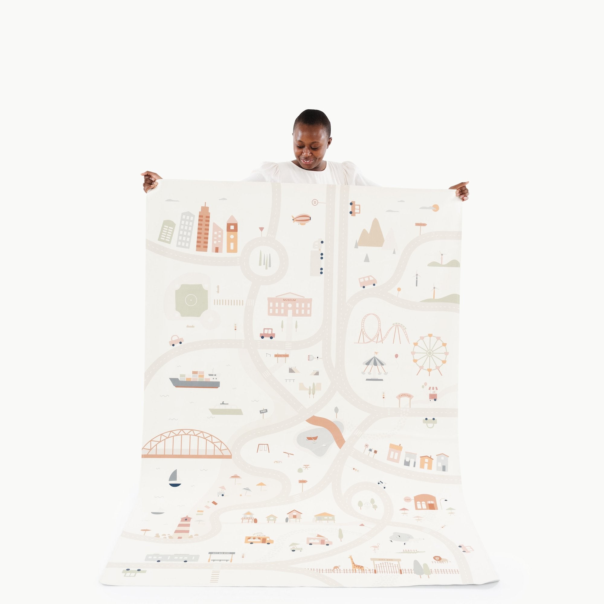 Uptown@Woman holding the Uptown Midi+ Mat