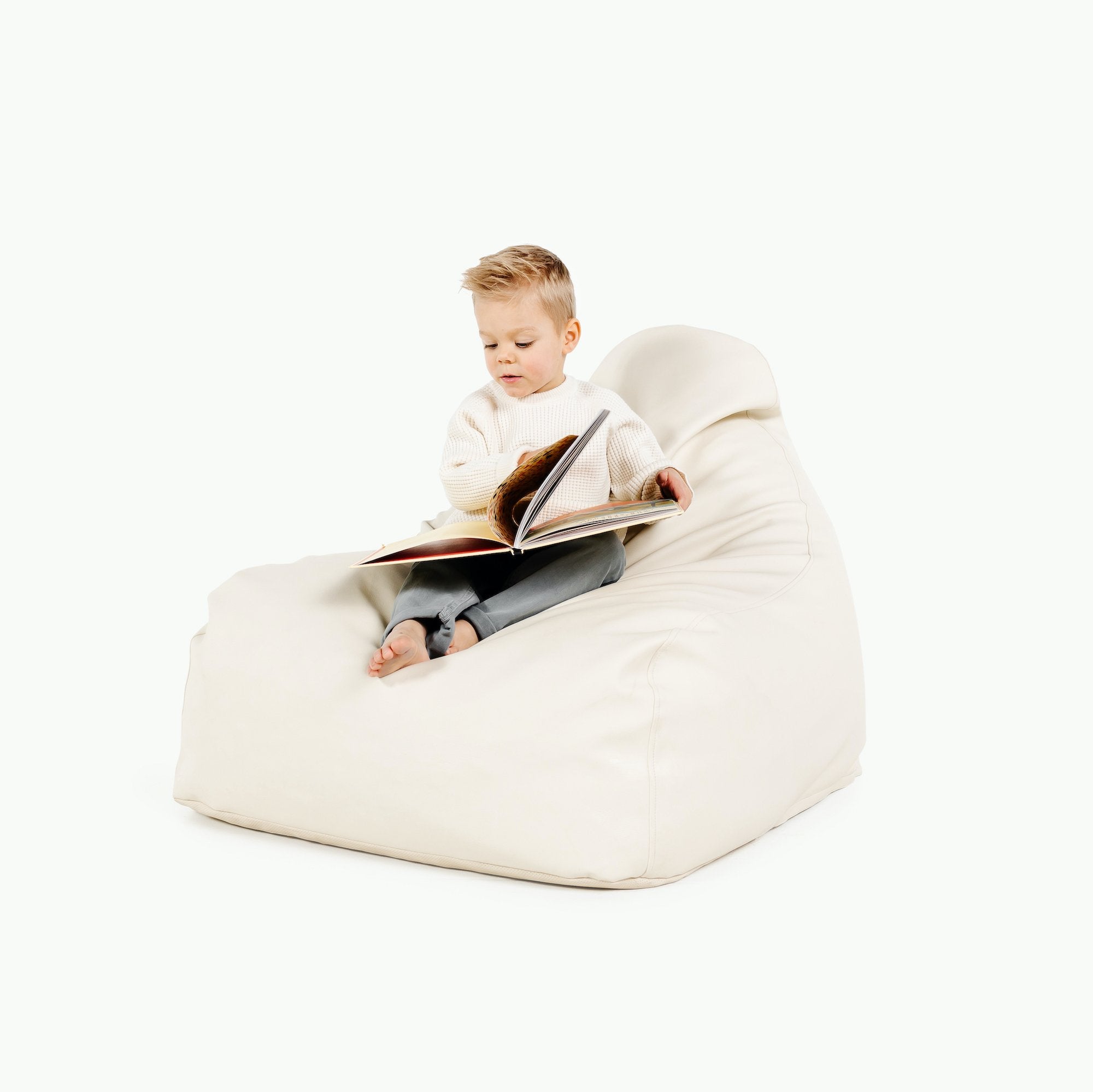 Ivory@Kid sitting on the Ivory Lounger