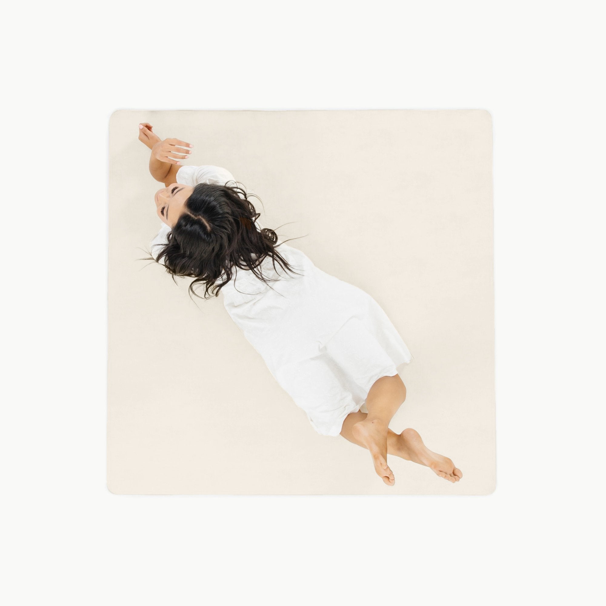 Ivory / Square@Overhead kid sitting on the Ivory Midi Square Mat