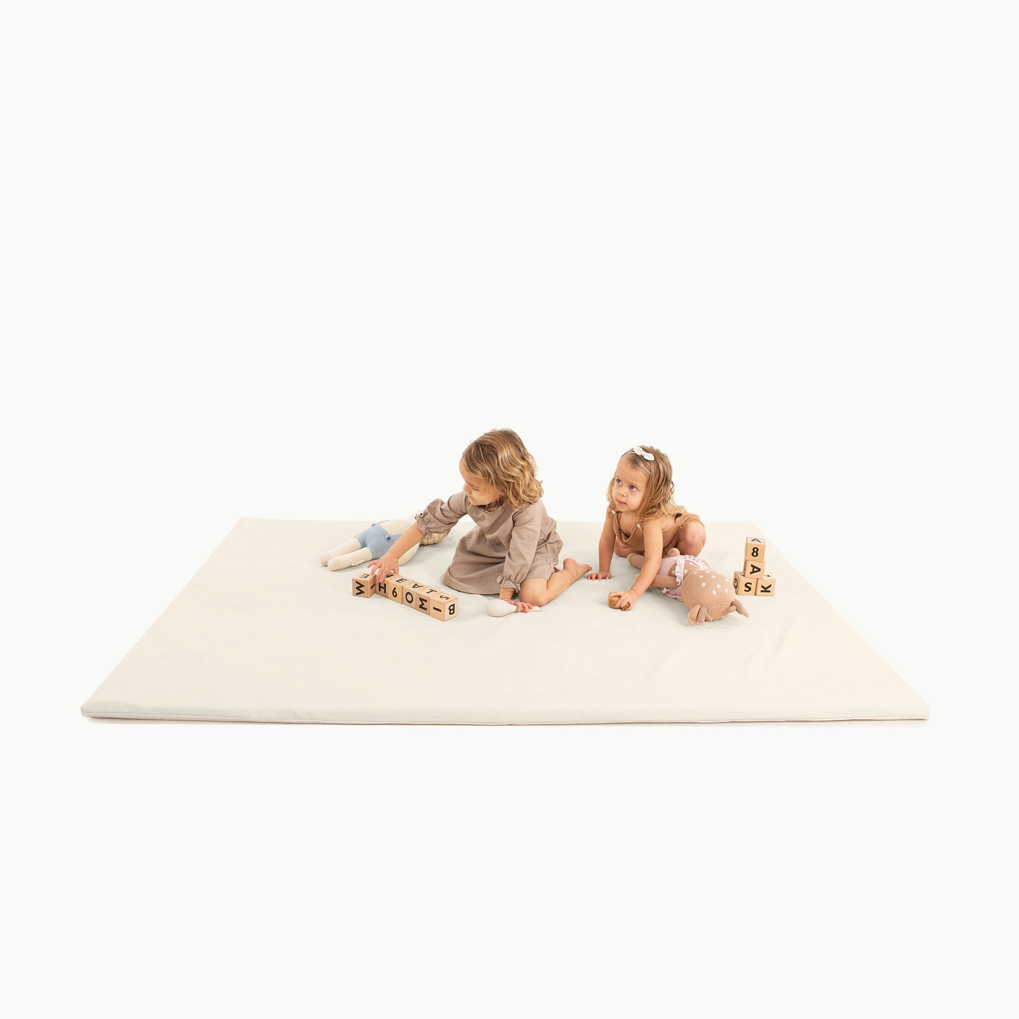 Ivory@Kids playing on Ivory Padded Midi+