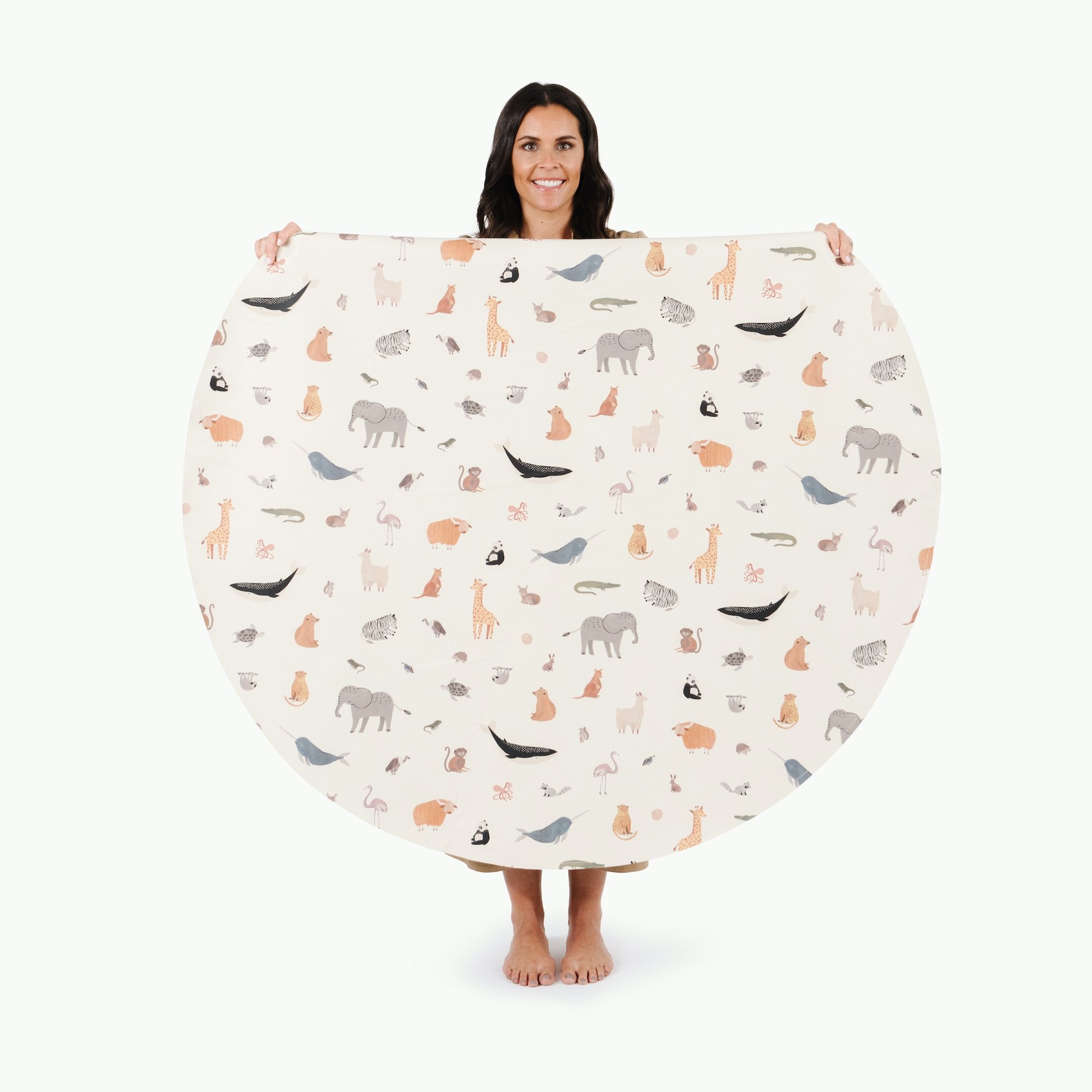 Menagerie (on sale) / Circle@Woman holding the Menagerie Midi Circle Mat