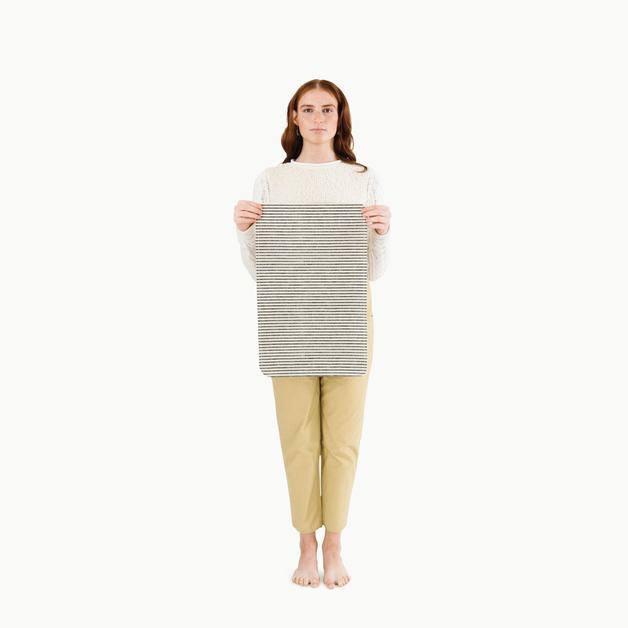 Stone Stripe / Baby Changing Mat@ Micro (Color) woman holding the stone stripe micro mat