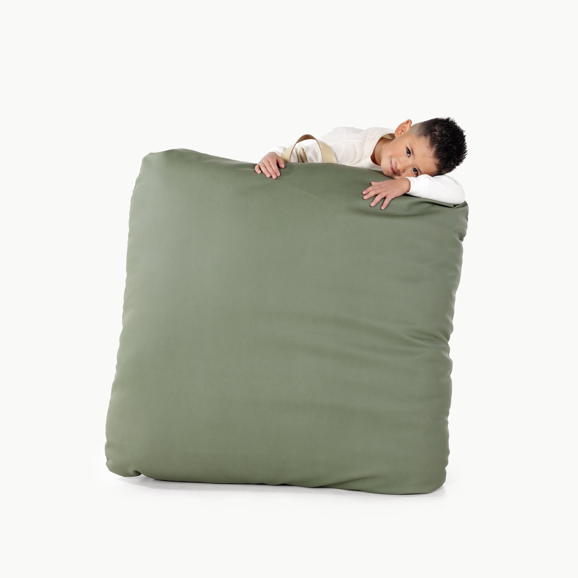 Thyme / Square@Kid holding the Thyme Square Floor Cushion