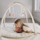 Ivory@Baby and sibling on the baby activity gym.