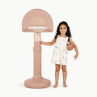 Tulle@Toddler using a basketball hoop to practice coordination and movement