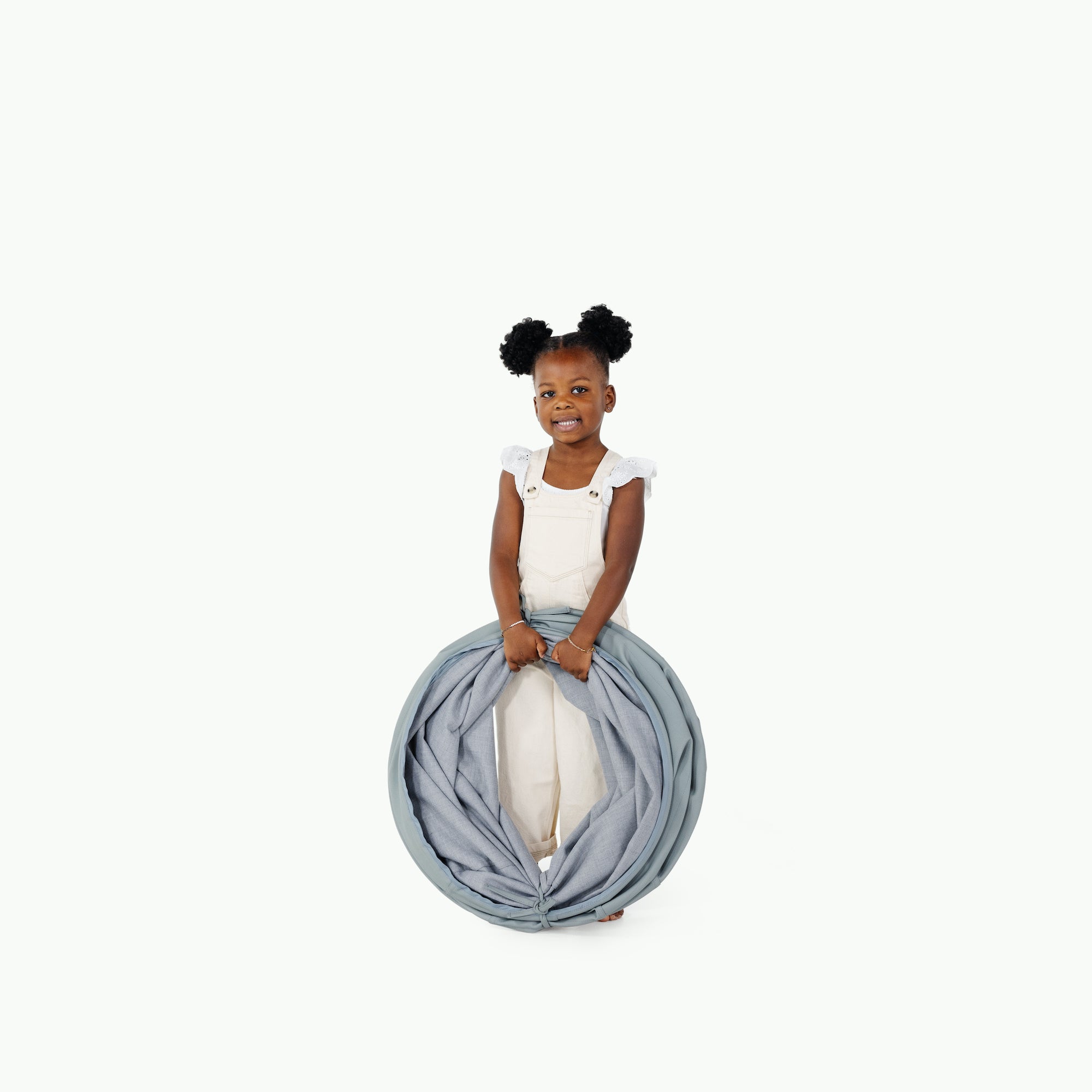 Amalfi (on sale)@little girl holding folded tunnel