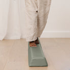 Seagrass (on sale)@close up of kids toes walking across the rollic by gathre balance beam
