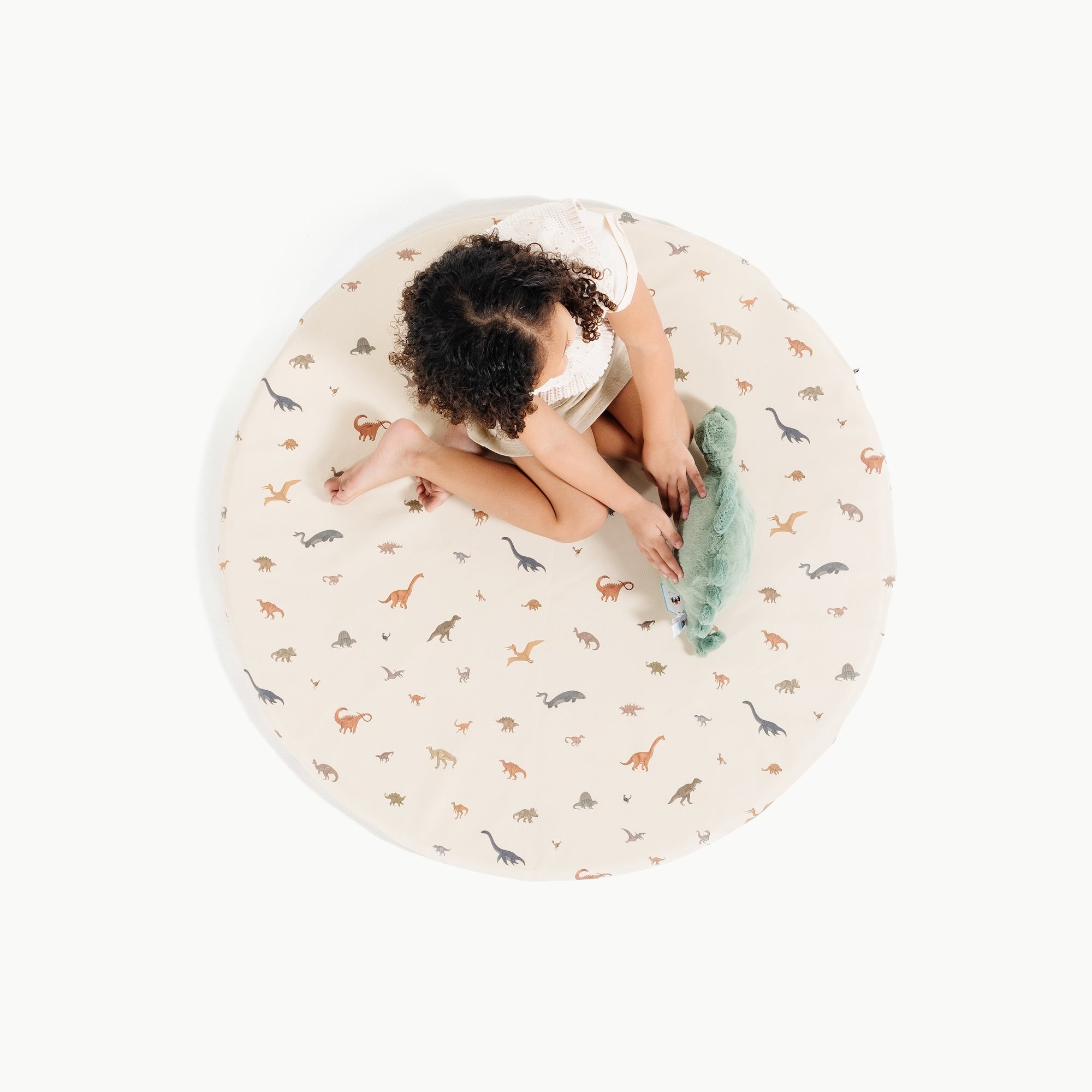 Dinosauria (on sale) / Circle@overhead of little girl on padded mini