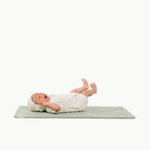 Flora (on sale)@baby laying on a micro+ changing mat