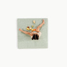Flora (on sale)/ Square@overhead of little girl playing on padded mat