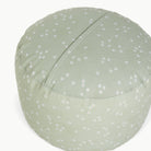 Flora (on sale)@zipper detail on circle pouf