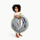 Flora (on sale)@toddler holding folded tunnel
