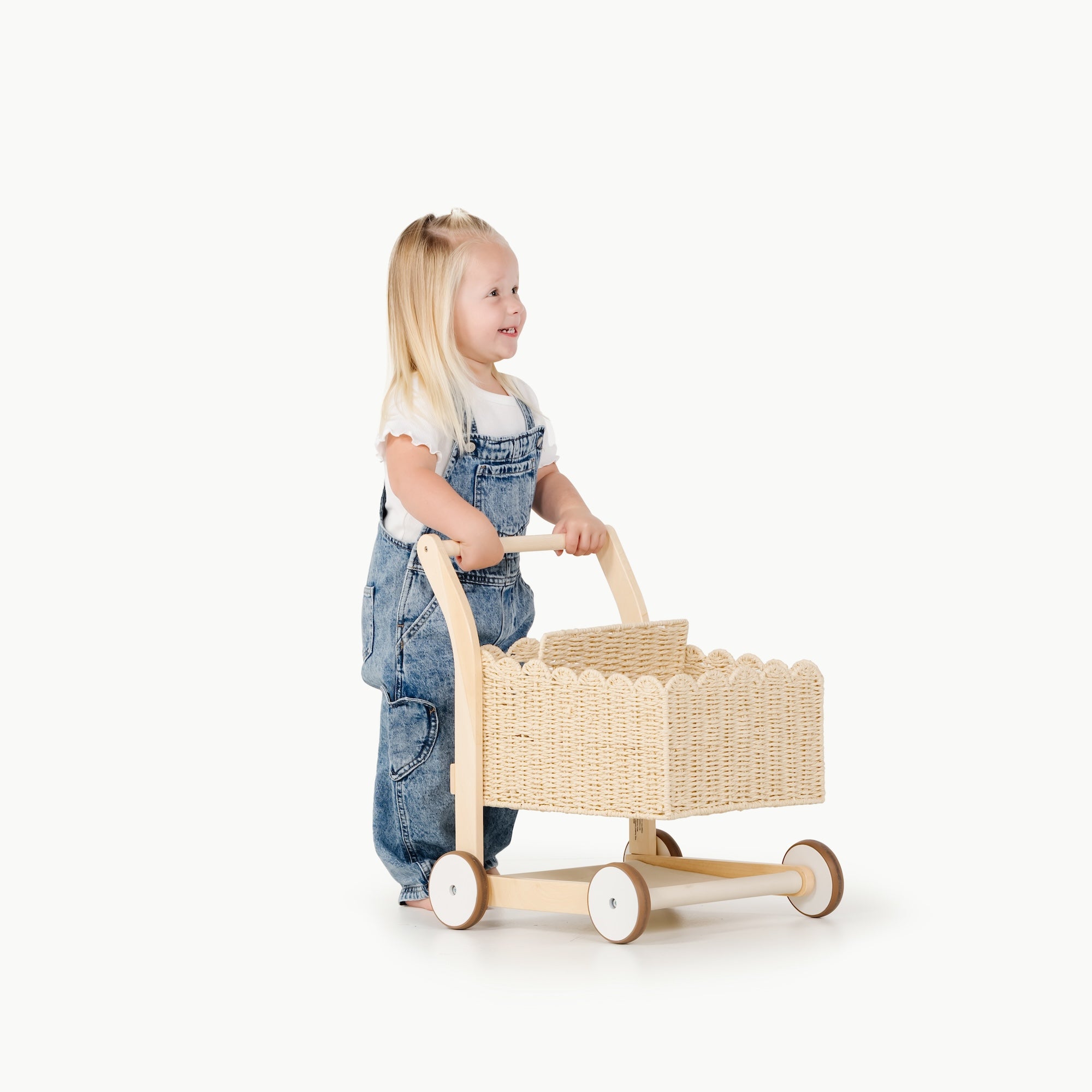 kid pushing the shopping trolley
