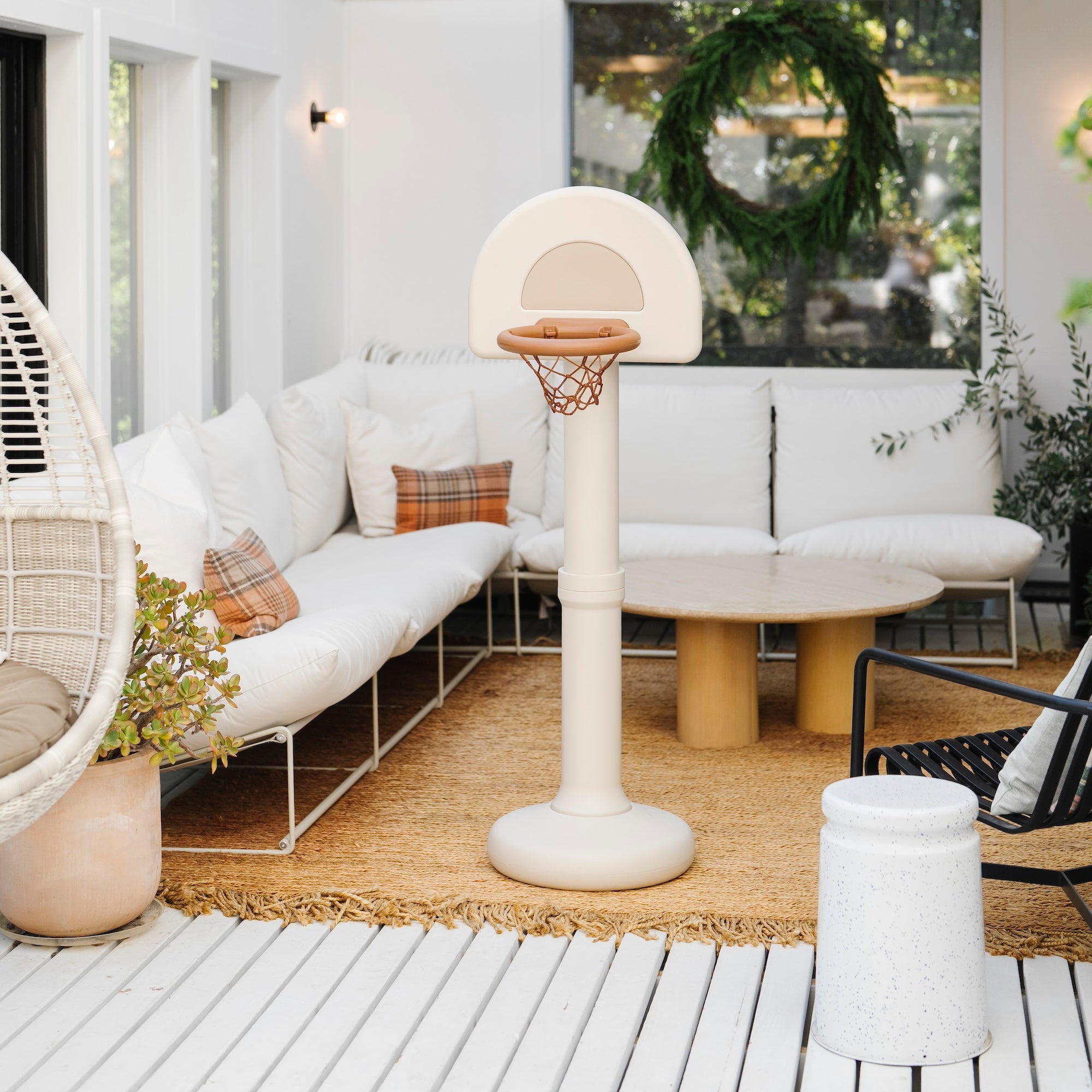 Ivory@Modern basketball hoop for toddlers styled in a home play space