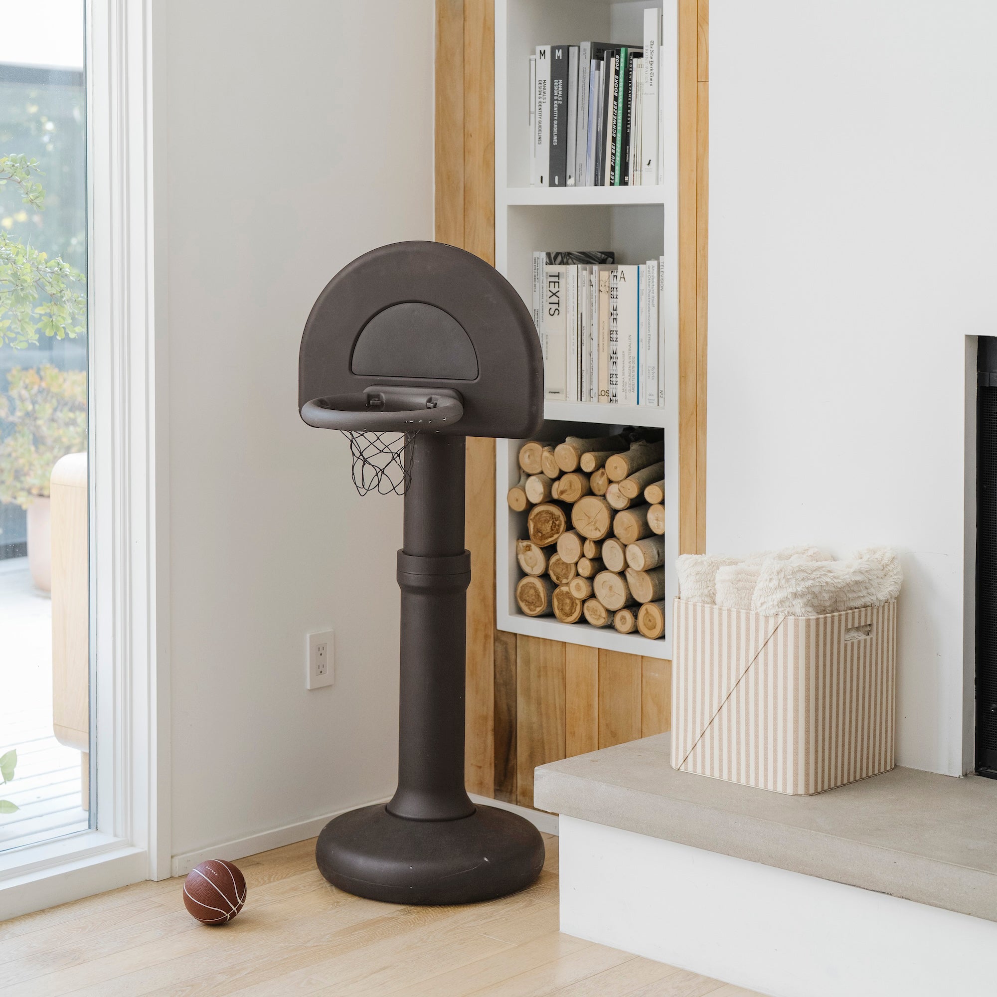 Raven@Modern basketball hoop for toddlers styled in a home play space