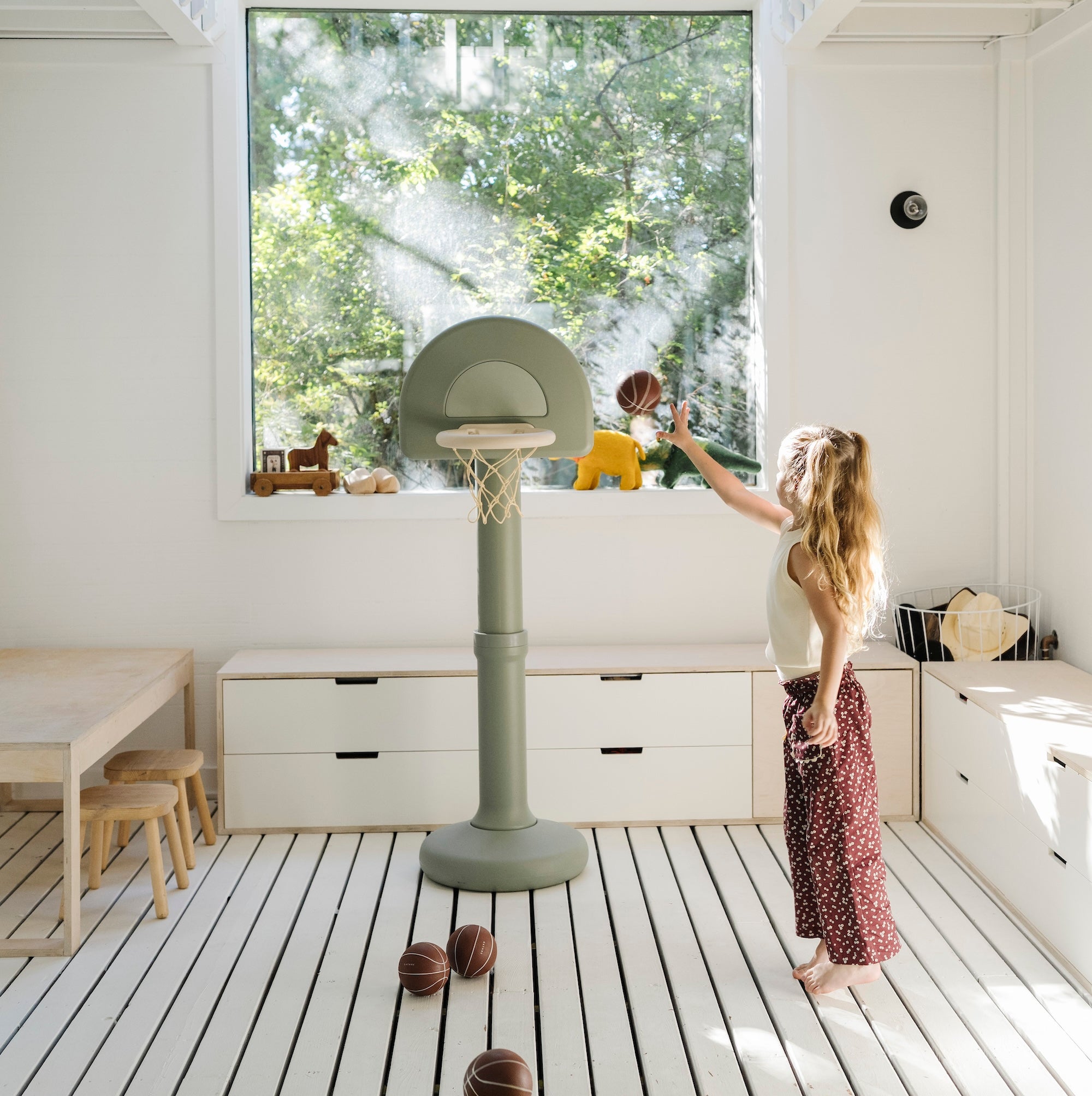 Palm@Modern basketball hoop for toddlers styled in a home play space
