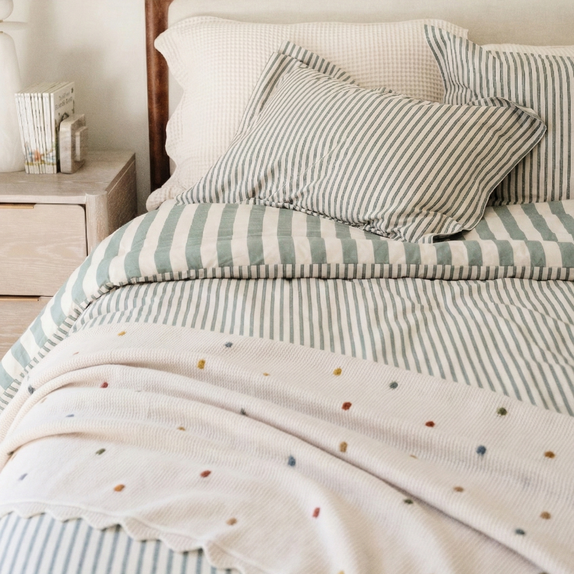 Ivory@Soft cotton throw blanket styled in a child’s bedroom