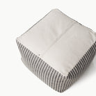 Houndstooth (on sale)@perforated bottom on the houndstooth square pouf