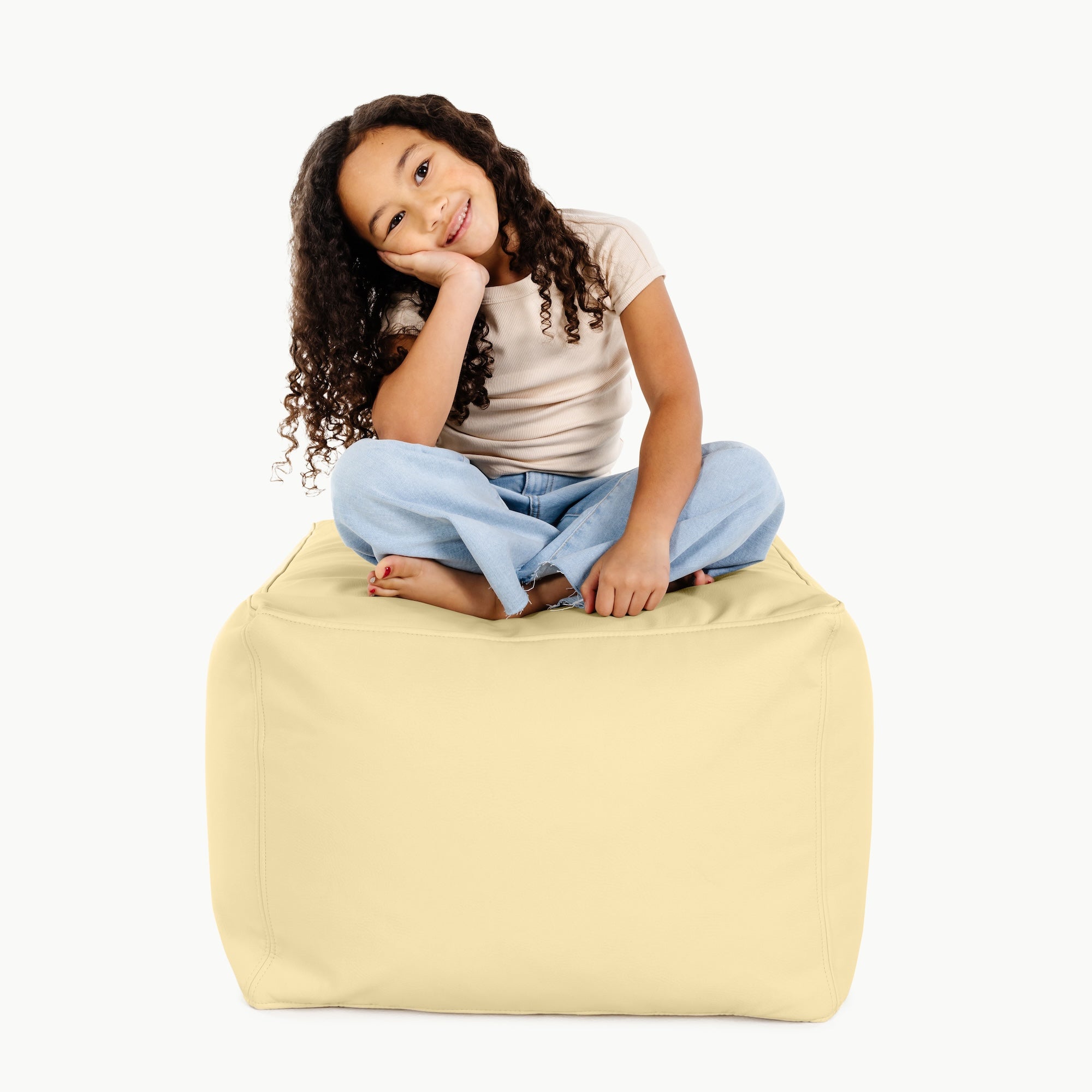 Mellow (on sale)@little girl sitting on pouf