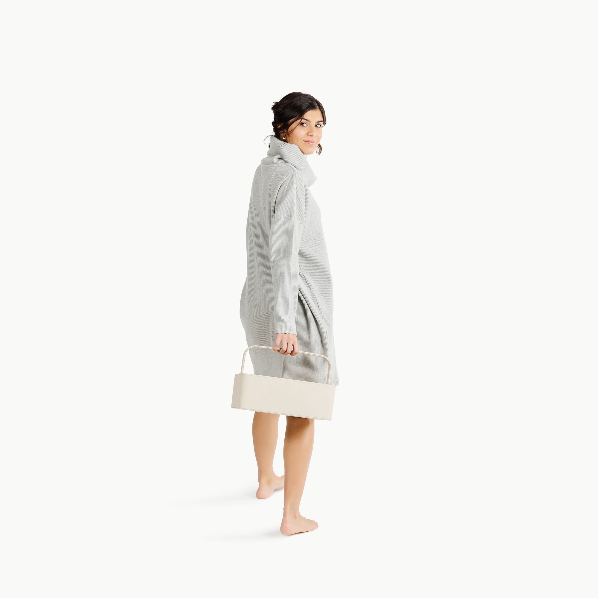 Ivory@Woman holding the Small Ivory Caddy