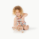 Ivory (on sale) / Square@Toddler engaging with bead maze to build hand-eye coordination