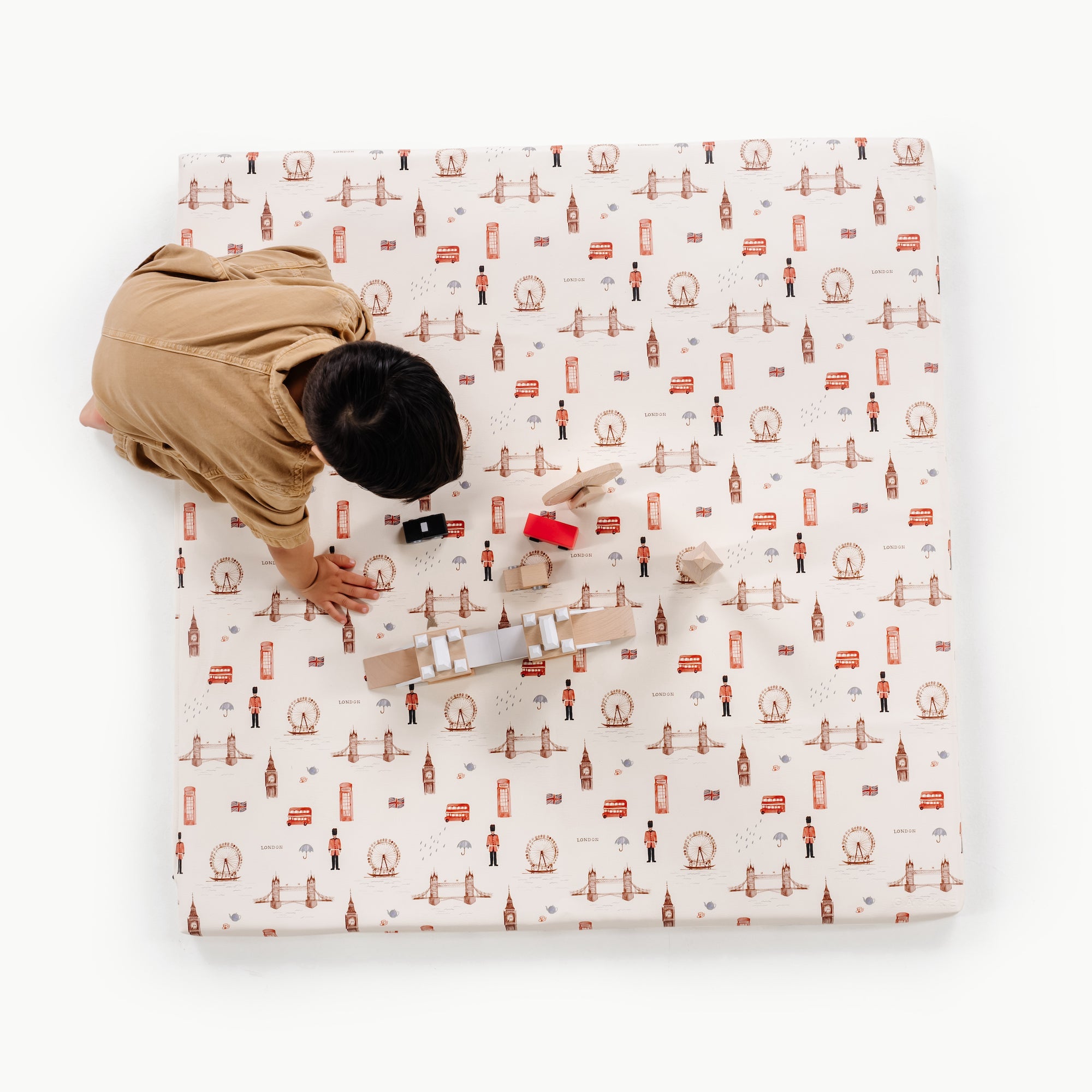 London (on sale) / Square@overhead of kid playing on the london padded square mat