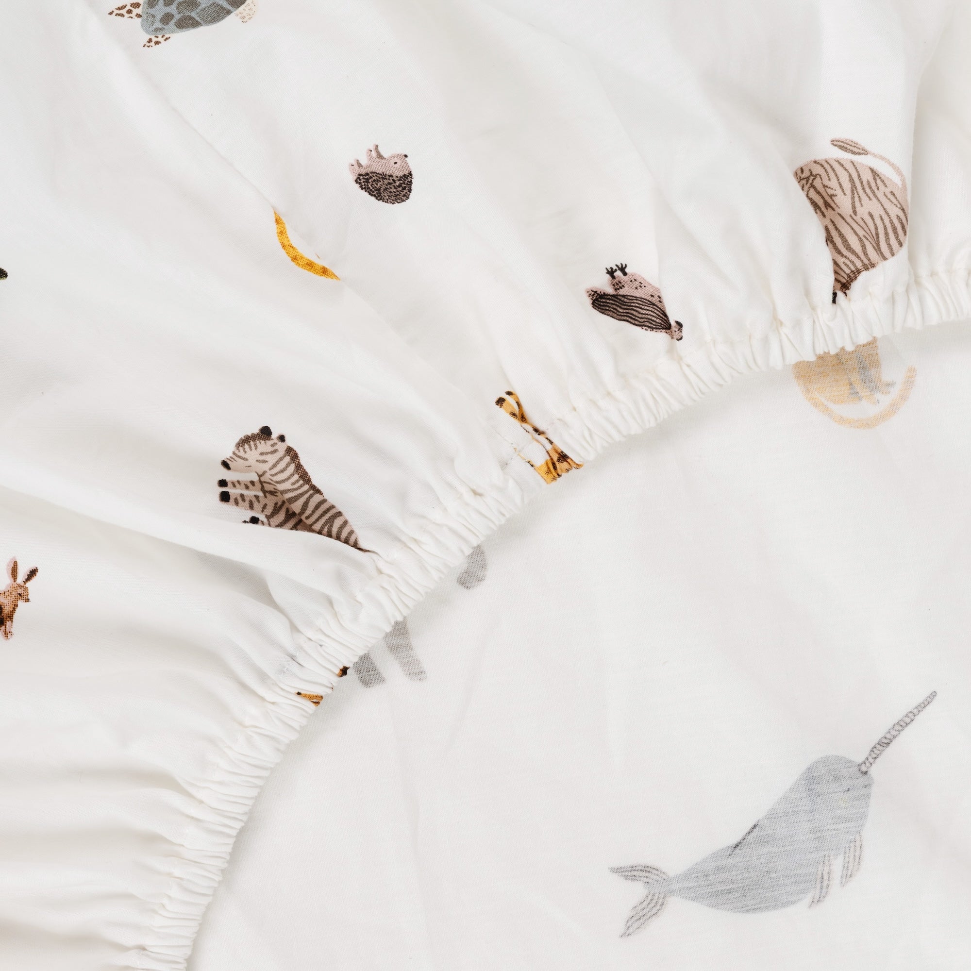 Menagerie@Kids cotton fitted sheet with playful printed design