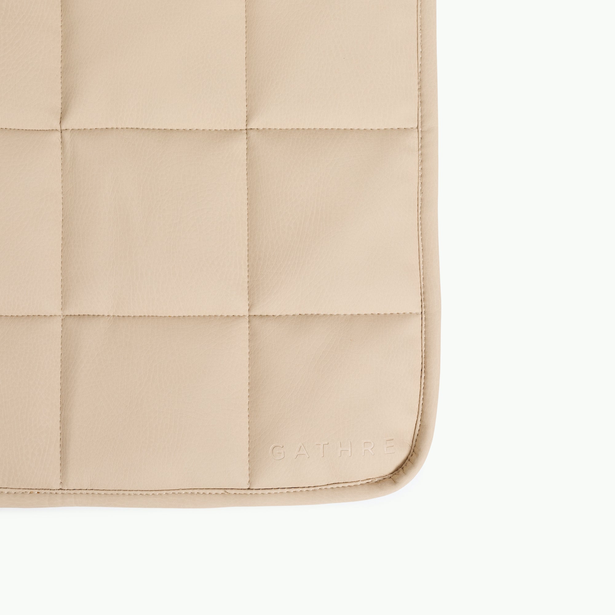 Millet / Square@Kid sitting on the Millet Mini Square Quilted Mat 