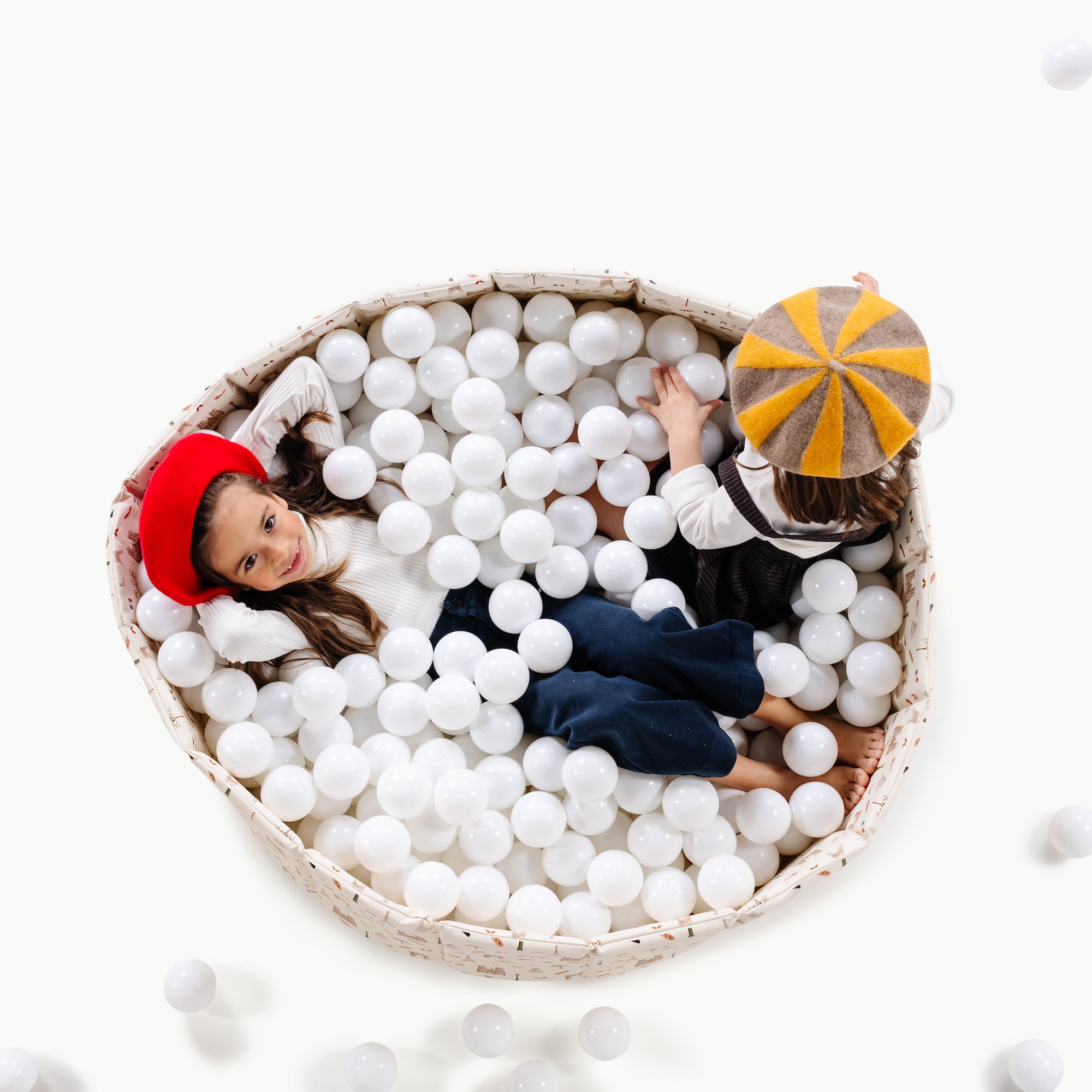 Paris (on sale)@Child playing in a soft ball pit designed for babies and toddlers