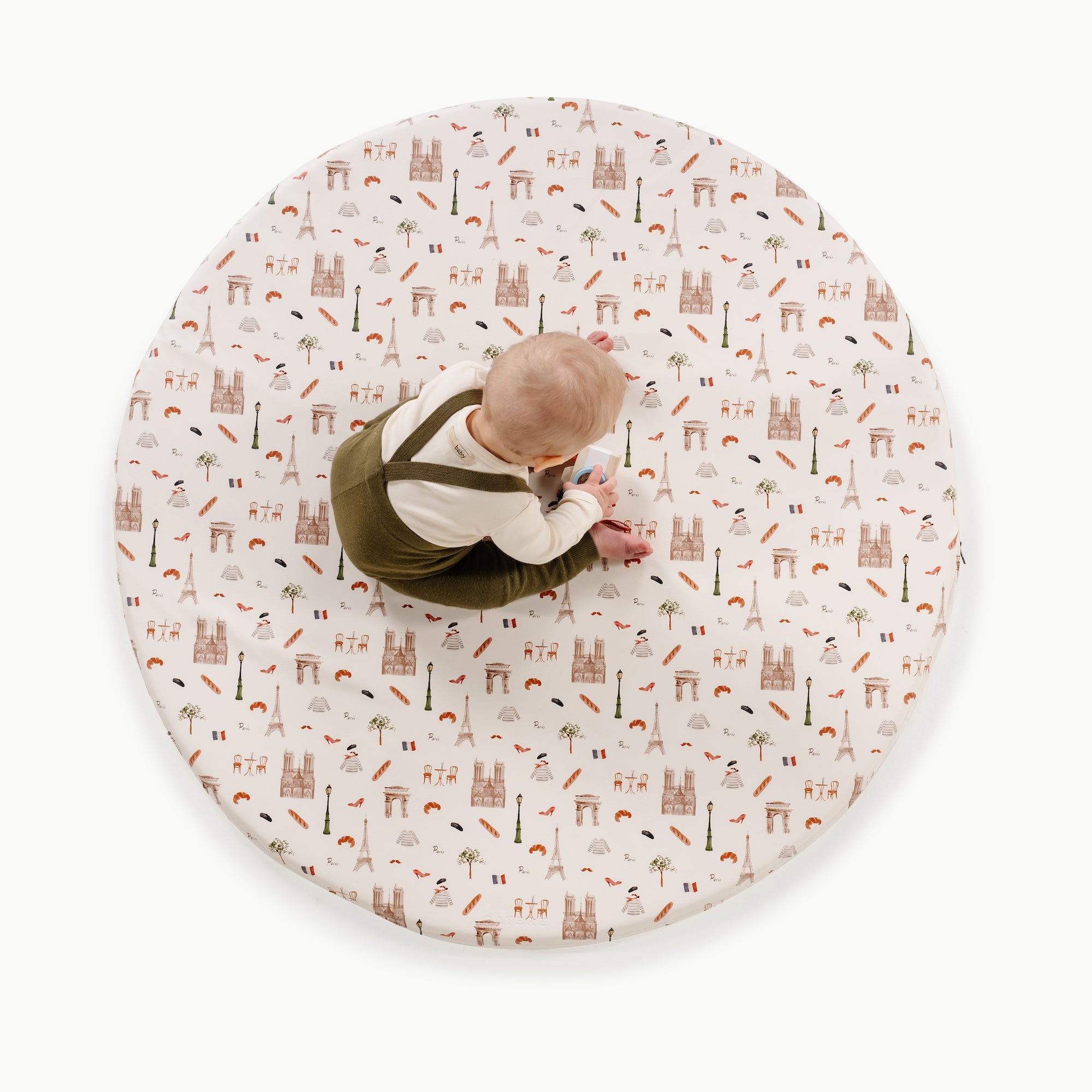 Paris (on sale) / Circle@overhead of kid playing on the paris padded mini circle mat