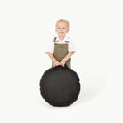 Raven (on sale)/ Circle@Little Boy holding the Raven Mini Circle Floor Cushion 