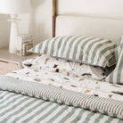 Agave Stripe@Kids cotton comforter set styled in a child’s bedroom