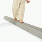 Seagrass (on sale)@close up of kids toes walking across the rollic by gathre balance beam