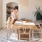 Wheat (on sale)@wheat tablecloth on table with family sitting at dining room table