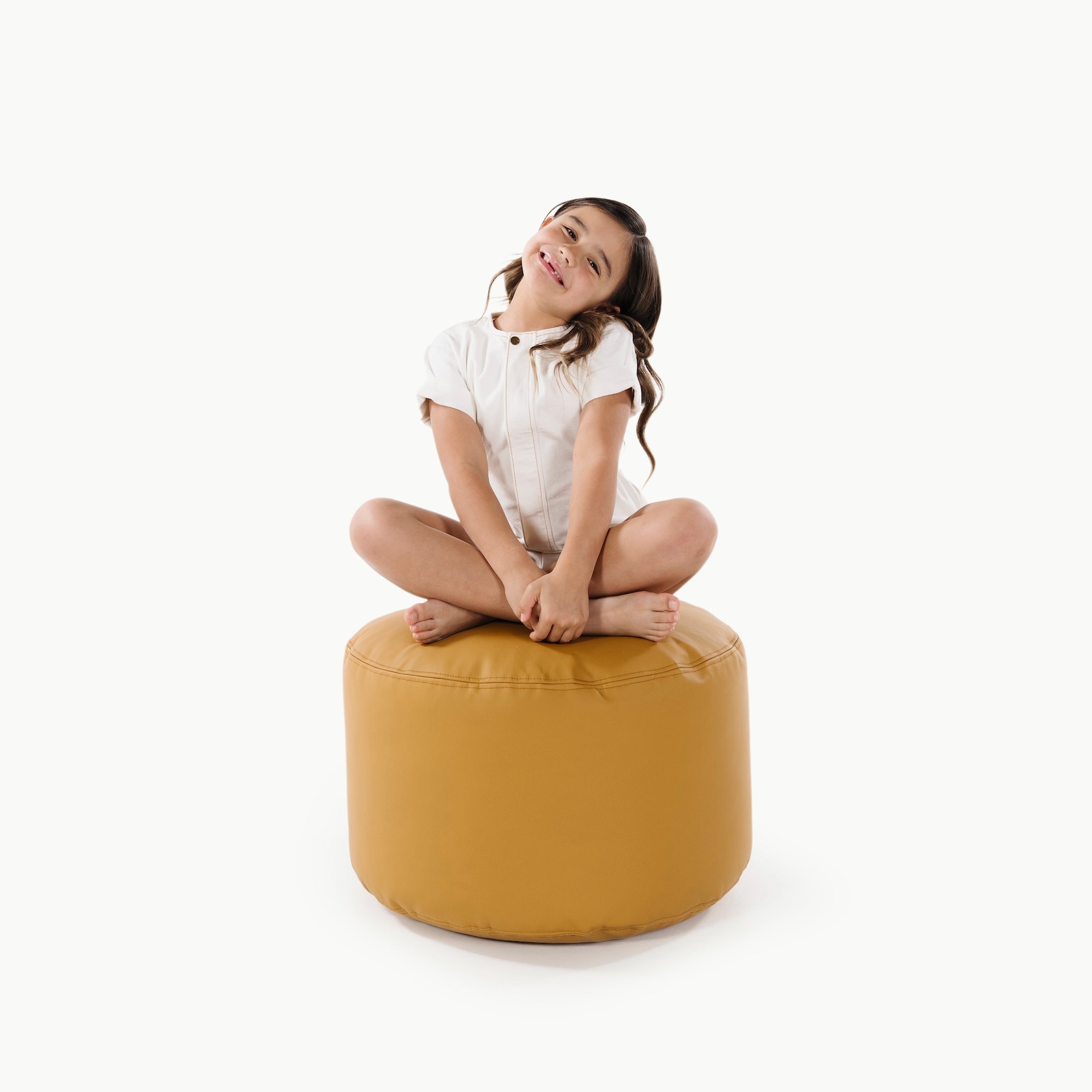Saffron (on sale)@little girl sitting on a circle pouf