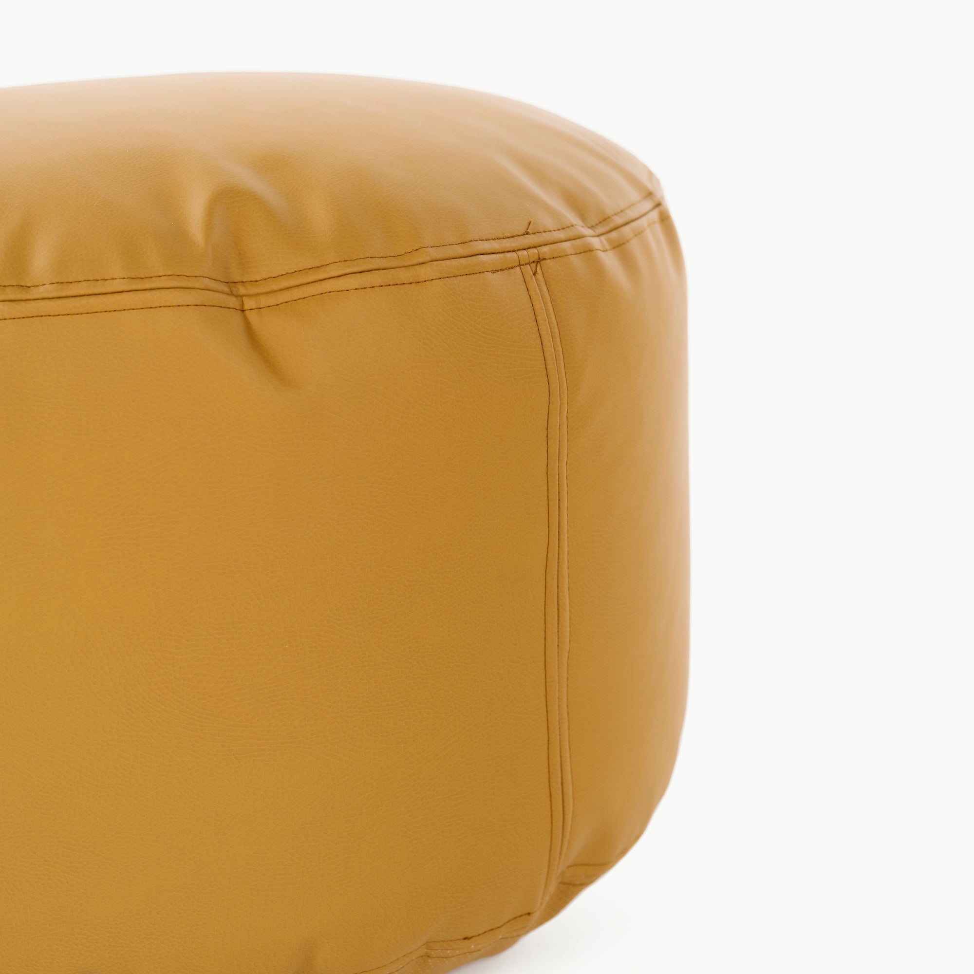 Saffron (on sale)@edging detail on a circle pouf