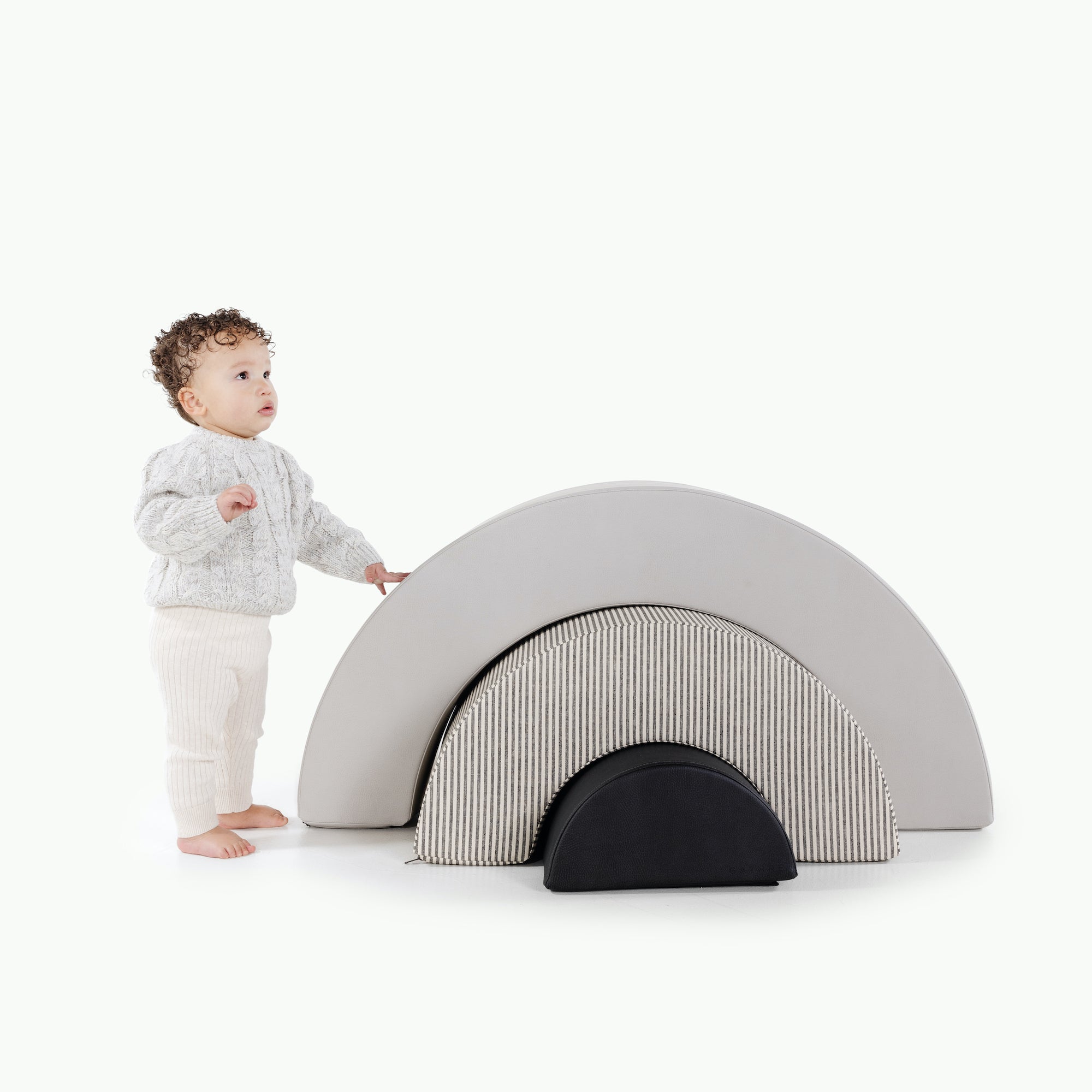 Gull • Stone Stripe • Raven (on sale)@kid playing on Stone Stripe Arc Playset