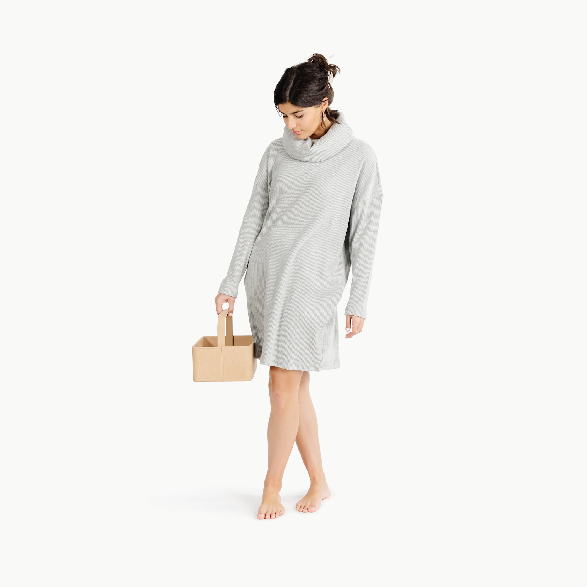 Untanned (on sale)@Woman holding the Small Untanned Caddy