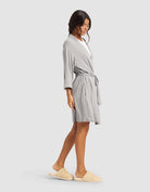 Grey@woman wearing a grey cozy earth robe